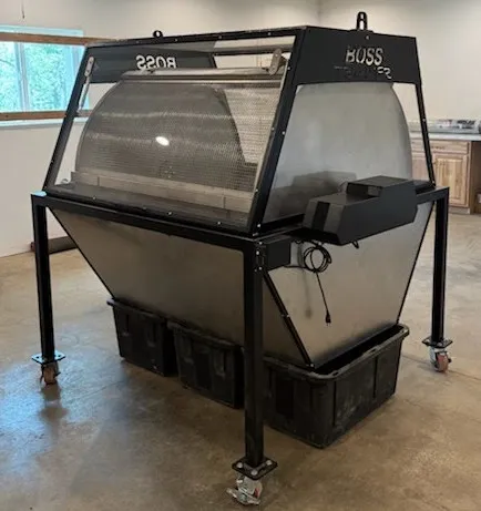 Boss Trimmer machine with stainless steel mesh drum and stainless steel frame on casters